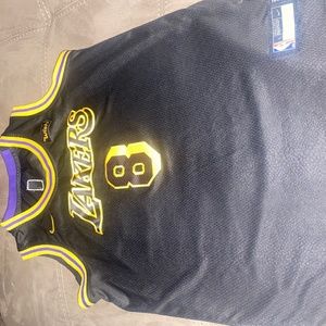 YL Gently used black, purple and gold Kobe Jersey